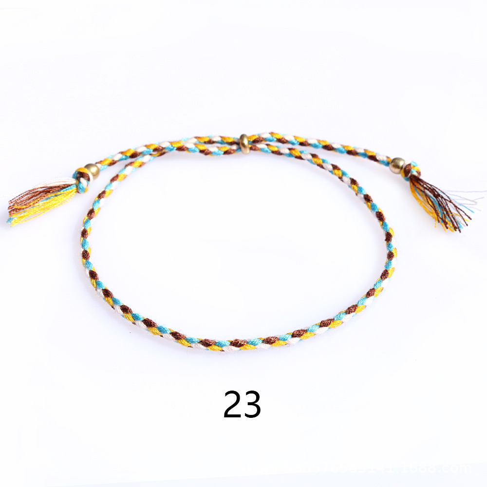Amazon popular colorido cuerda de algodón amistad pulsera perlas de cobre borla pulsera tejida a mano ajustable hombres y mujeres pulsera