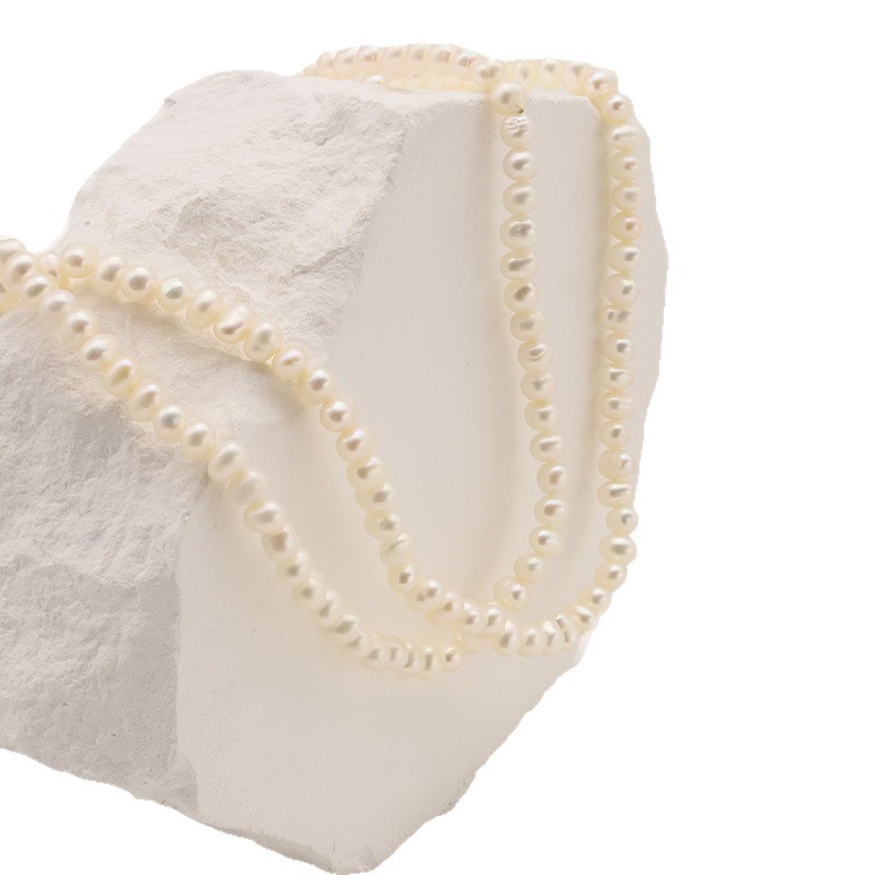 Luz de lujo retro nicho multi-capa de perlas apilables collar largo de cadena de suéter de perlas de agua dulce natural