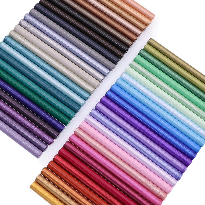 Palo de cera de pintura al fuego 94 colores 10*0,7 cm La barra de cera pequeña redonda se puede mezclar con la pistola de cera se puede utilizar en fábrica al por mayor