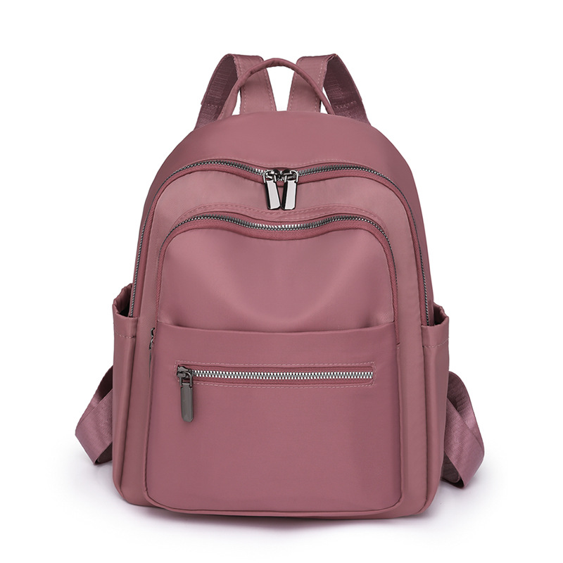 Transfronterizo al por mayor 2023 nueva mochila de nailon para mujer coreana simple y versátil mochila de viaje anti-salpicaduras de agua mochila escolar