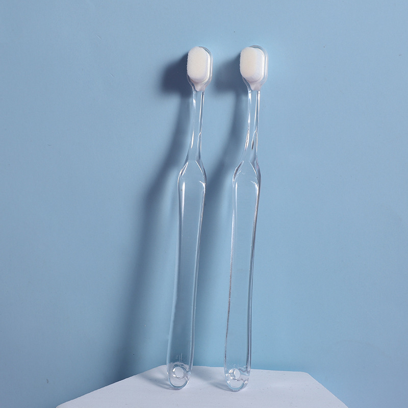 New transparent 6-12 years old ten thousand root soft big head baby children's toothbrush independent foreign trade spot wholesale