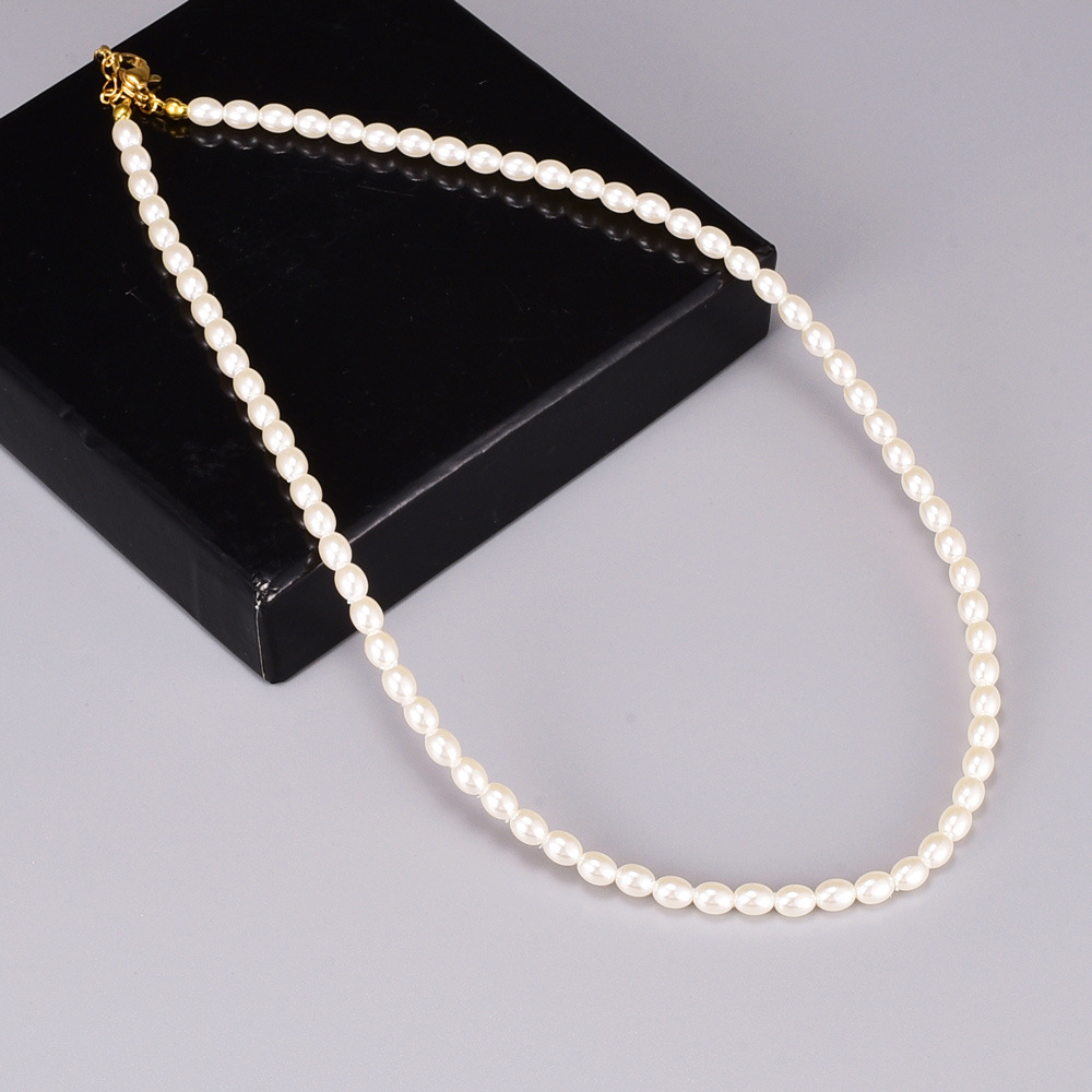 Fashion Millet Bead Titanium Steel Plated 18k Gold Clavicle Chain Necklace display picture 4