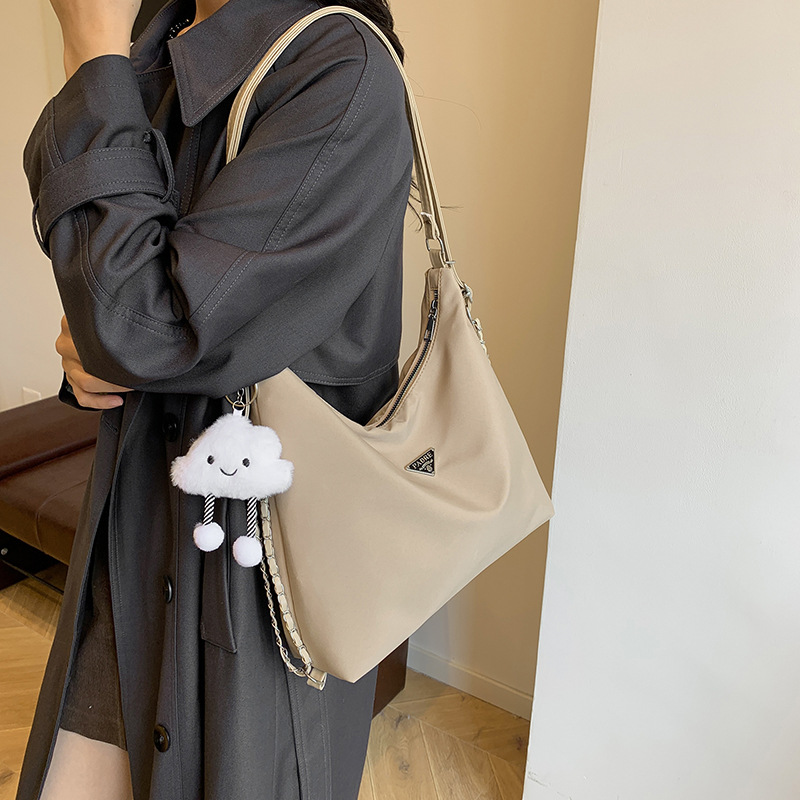 Bagos de tela de nylon de gran capacidad de peso ligero versátil para mujeres 2024 nueva mochila de hombro para viajar bolsas de hombro