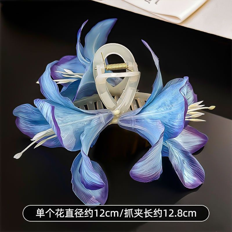 2 clip de flores de lirio azul