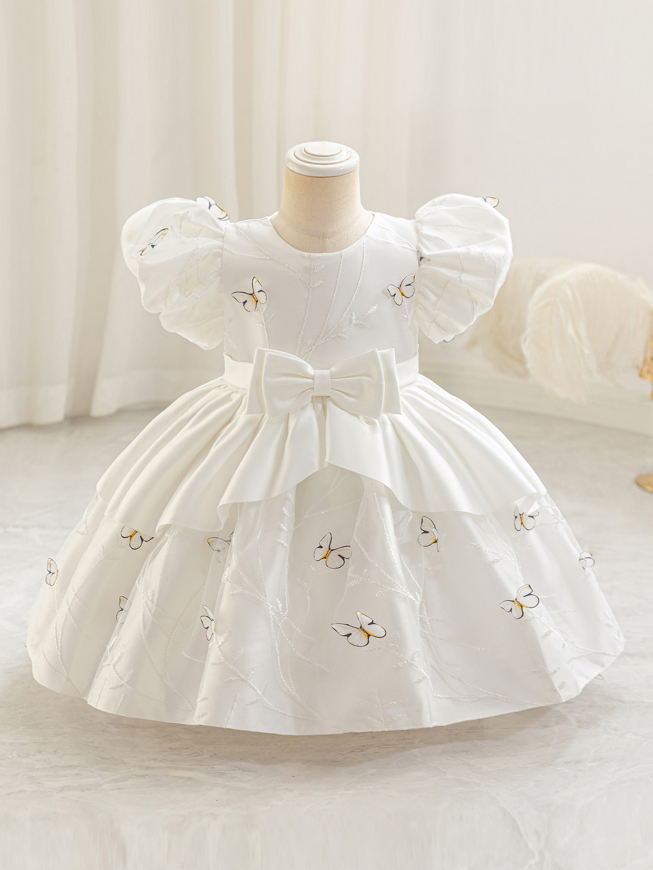 2025 nuevo bebé transfronterizo vestido infantil ropa de abrigo de arco vestido de bebé vestido vestido de abrigo al por mayor