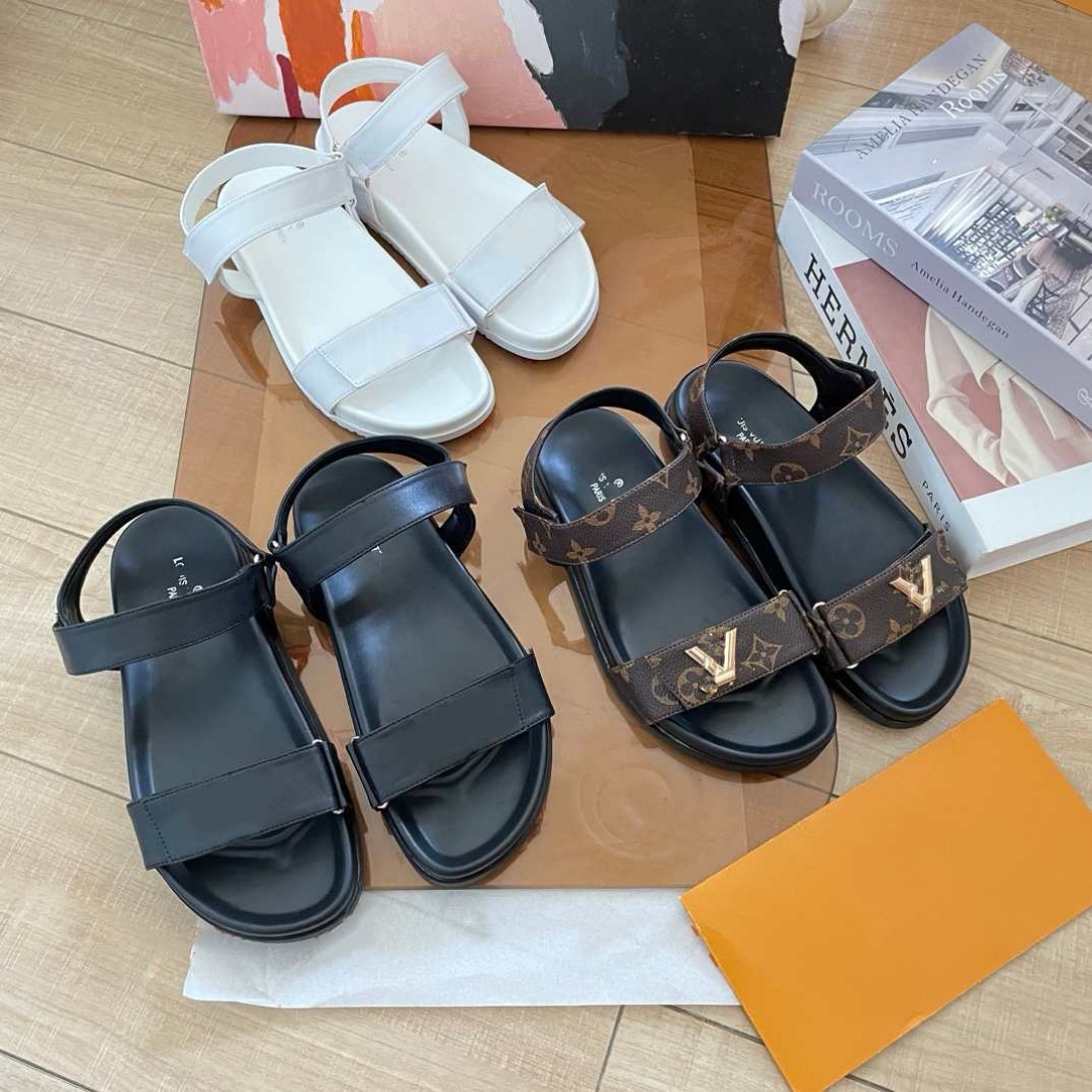 Donkey Home estación europea diseñador de alta versión 2025 nuevas sandalias de playa de cuero zapatillas de hebilla metálica plana