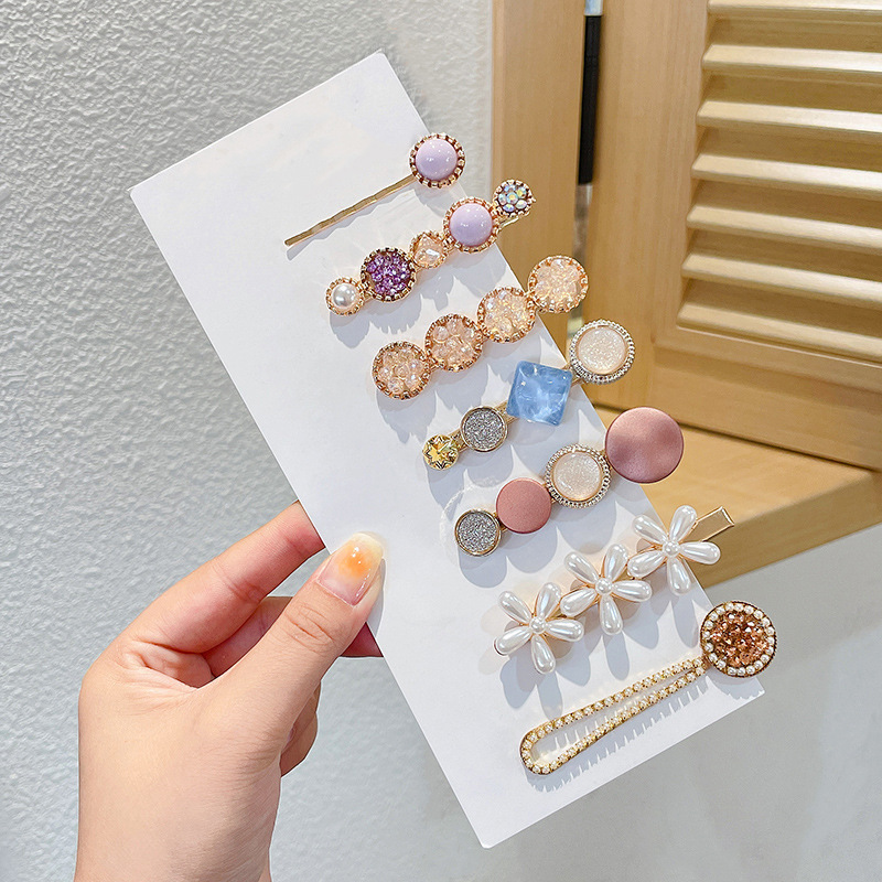 Clip de flequillo lateral rojo de la red femenina 2025 nueva horquilla simple clip de una línea horquilla clip de cabello roto tocado clip de pico de pato