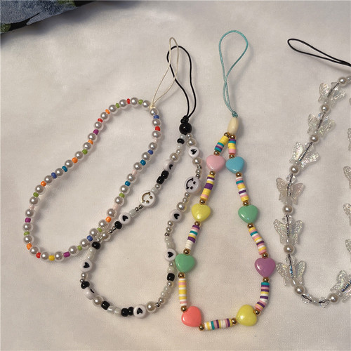 New Korean version ins creative bohemian soft clay smiling face pearl beaded butterfly mobile phone lanyard mobile phone chain for women