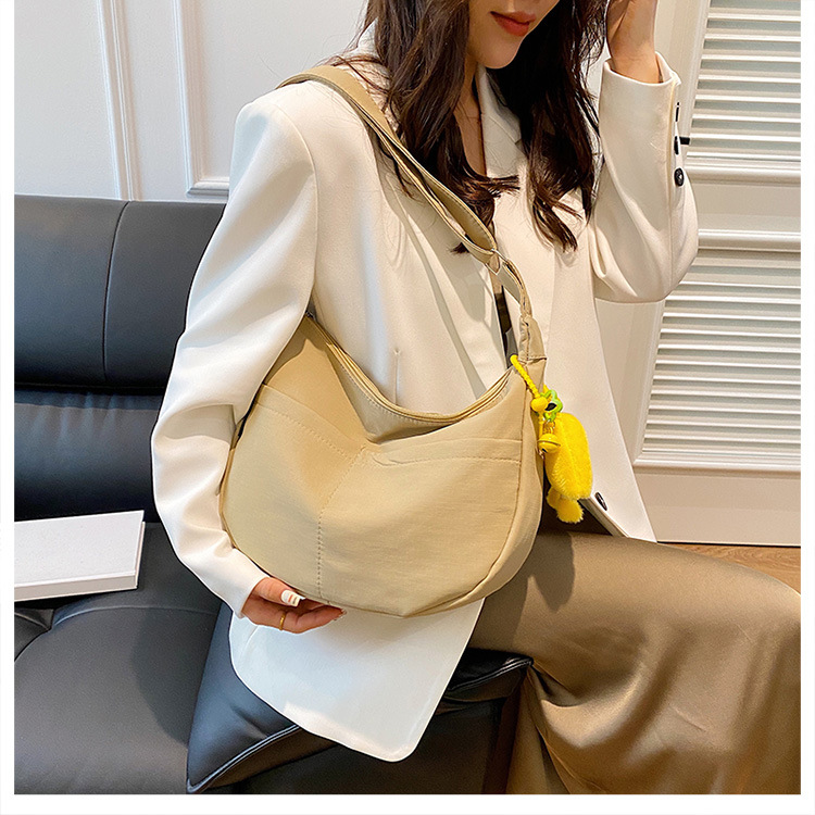 Simple solid-color canvas bag 2024 new style Japanese large-capacity single-shoulder dumpling bag, versatile for school and commuting crossbody bag details Picture