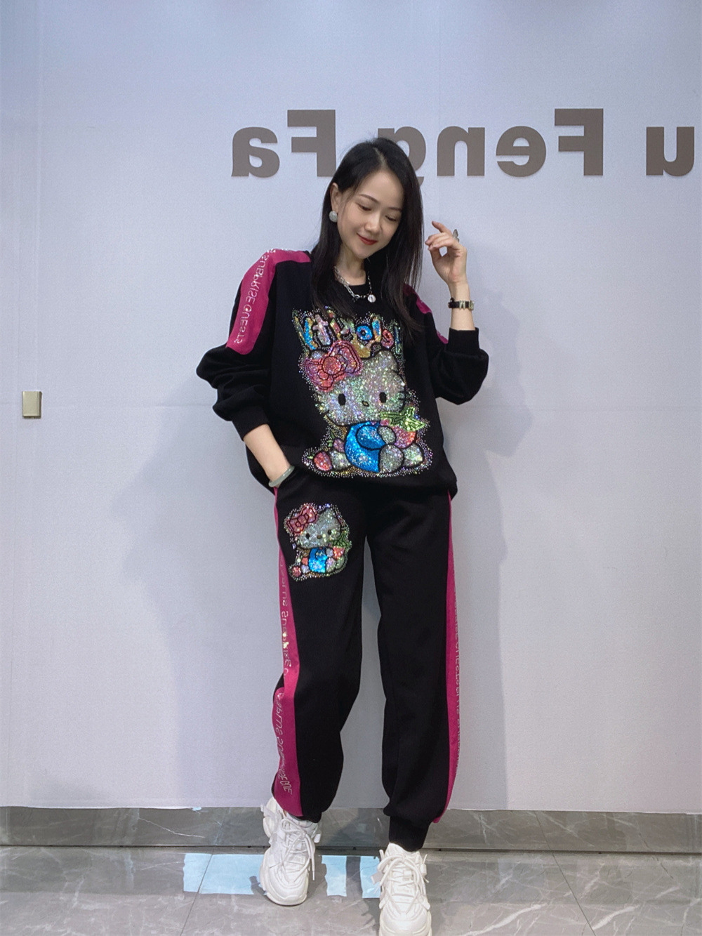 Trajes de moda de la estación europea de la industria pesada caliente taladro chaqueta de manga larga cintura elástica grande pantalones de caída de dos piezas para mujeres
