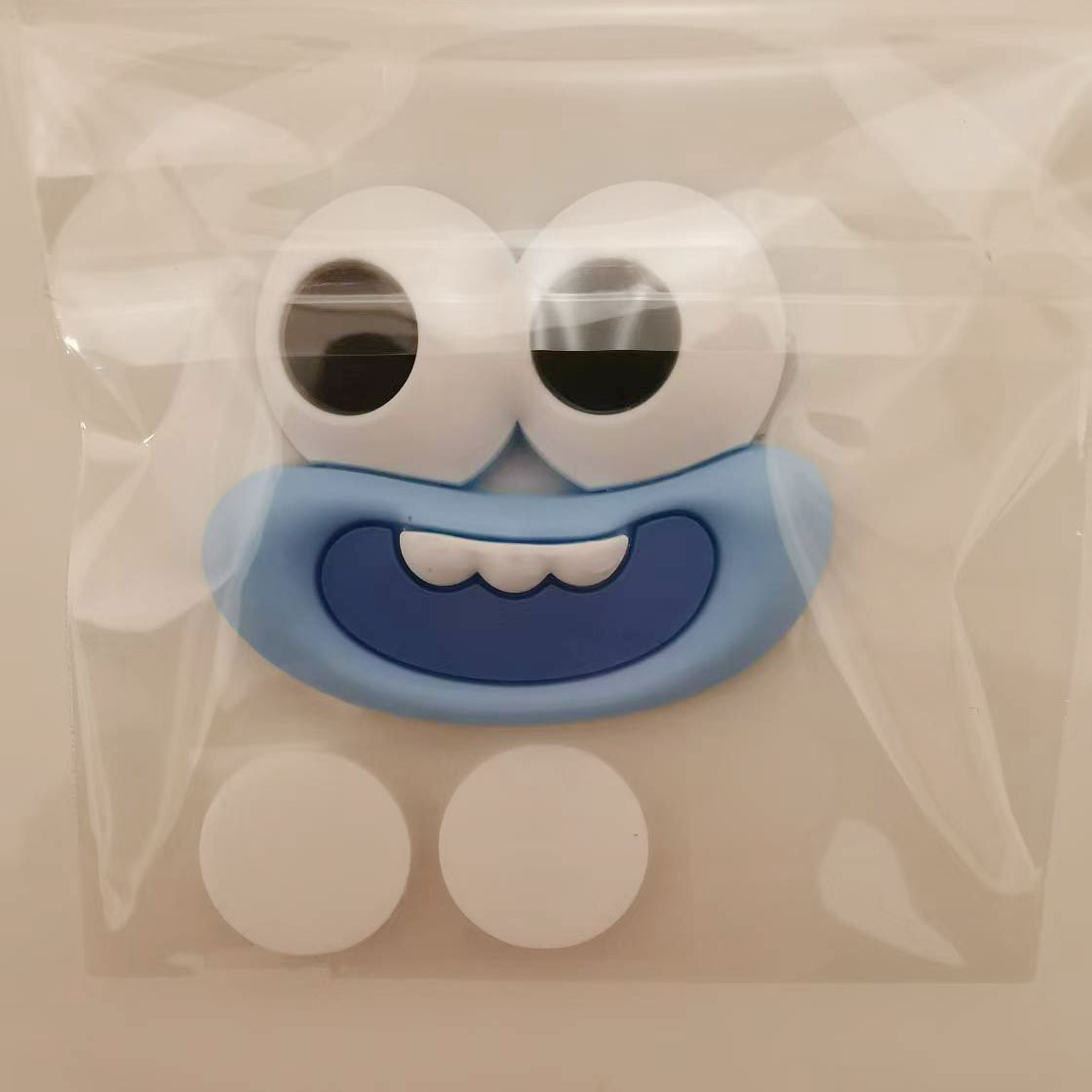 Blue toothy mouth + glue individually packaged