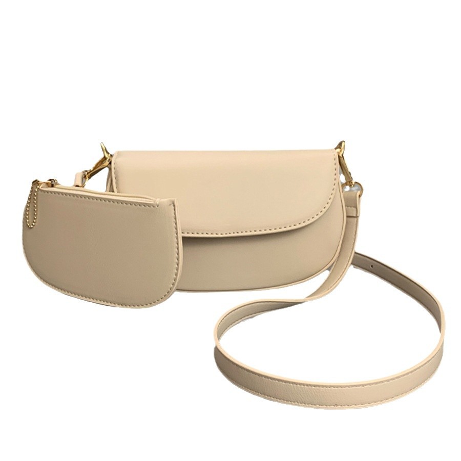 2025 moda bolsos de silla de montar de tendencia sólida Baise casual bolsos de hombro para enviar bolsos de tarjetas pequeñas del mismo color personalidad estética