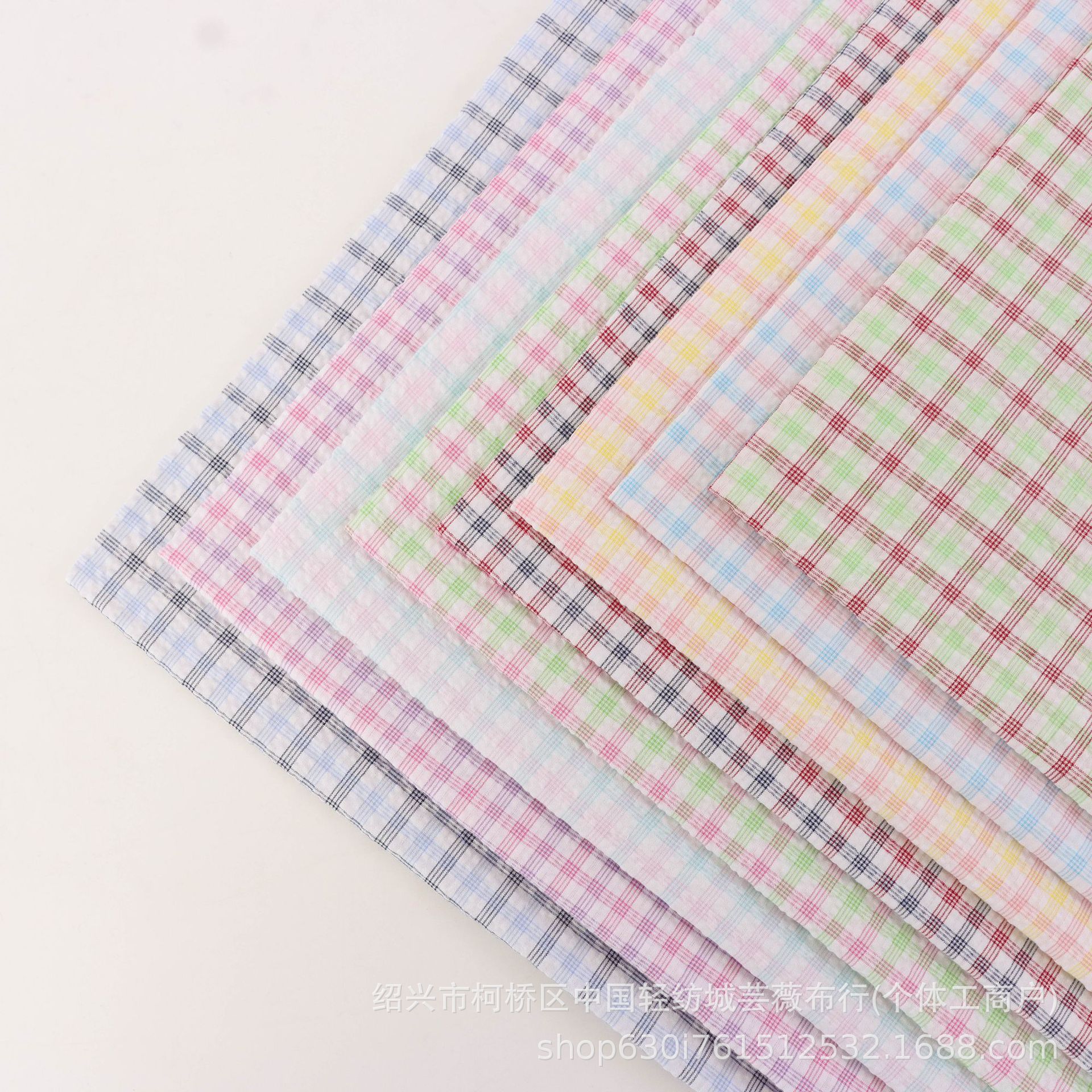 现货涤棉色织泡泡格 制服衬衫女装童装连衣裙面料 泡泡纱格子布面