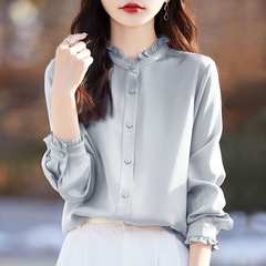 雰囲気の木の耳元のシャツの女性のコートのシャツのスタンドカラーの優雅な底のカーディガンの中にファッションの上着の長袖を掛けて合わせます。