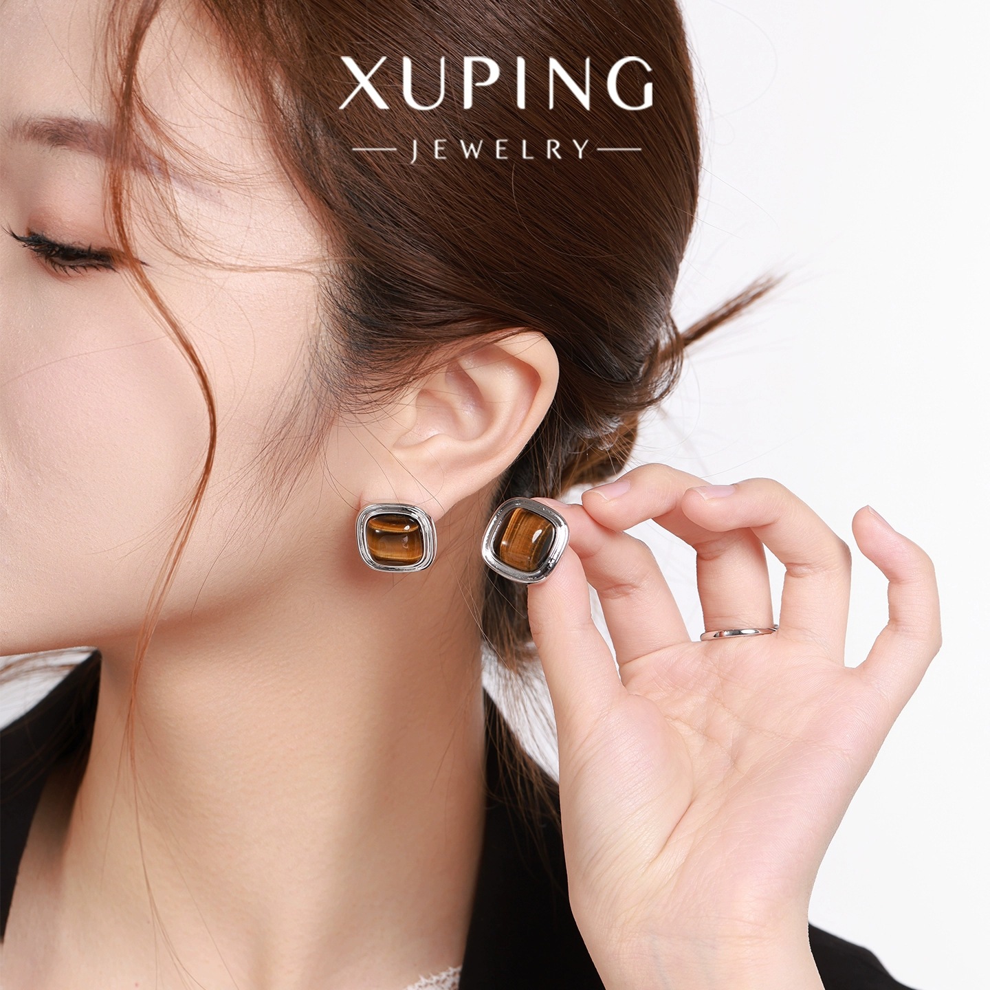 Xuping geometría cuadrada mirad imitación de piedra de ojo de tigre simple nicho de alta sensación otoño invierno auriculares al por mayor