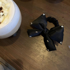 韓国のキラキラ黒系の蝶結びのキラキラとした髪飾りの高弾性の髪飾りの後頭部の髪ひもの新型