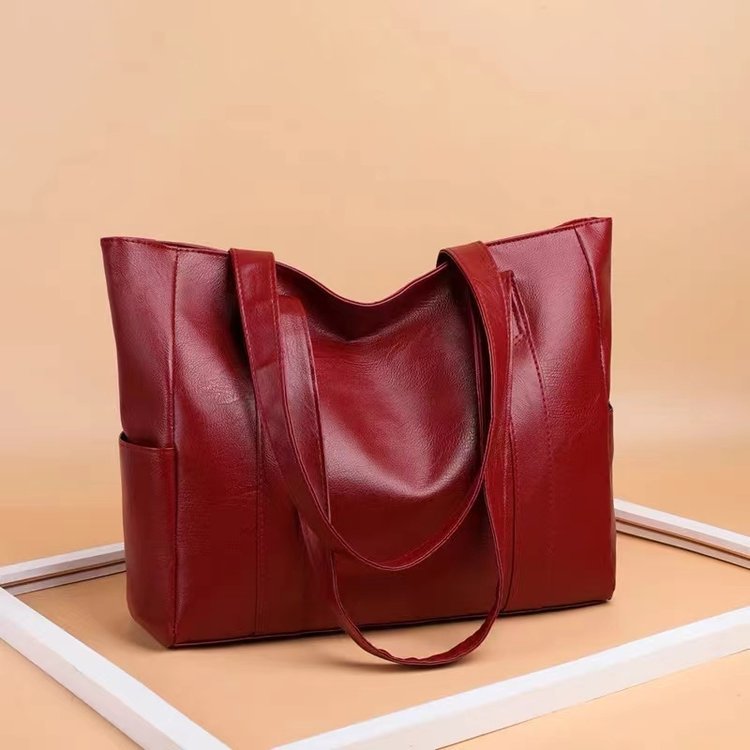 2024 European and American New Fashion Simple PU Soft Leather Trendy Handheld Tote Bag Large Capacity Shoulder Bag for Women_voghion.com