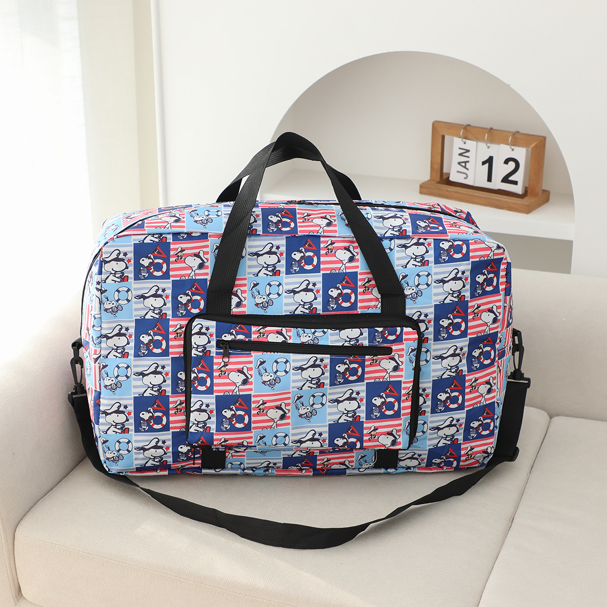 虹熊クロミ大容量手提げ旅行袋は旅行箱のポールに挿してもいいです。