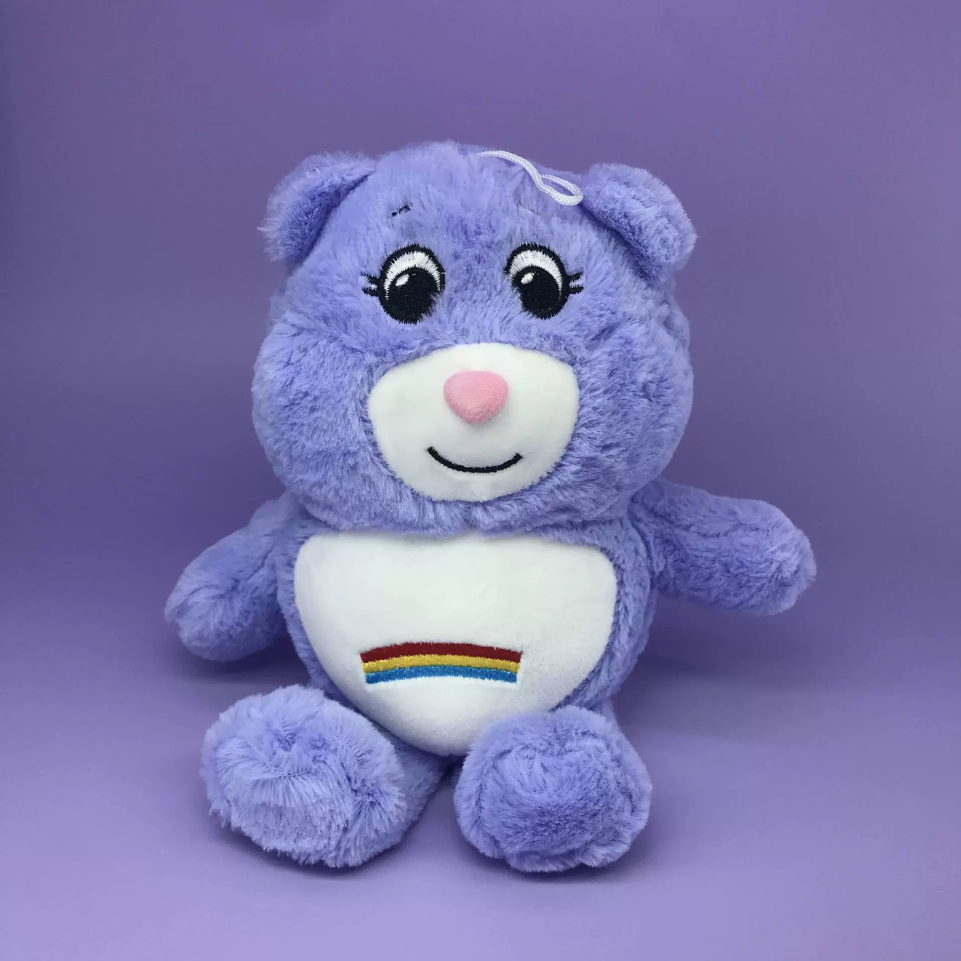 Cartoon appeases rainbow doll, plush toy