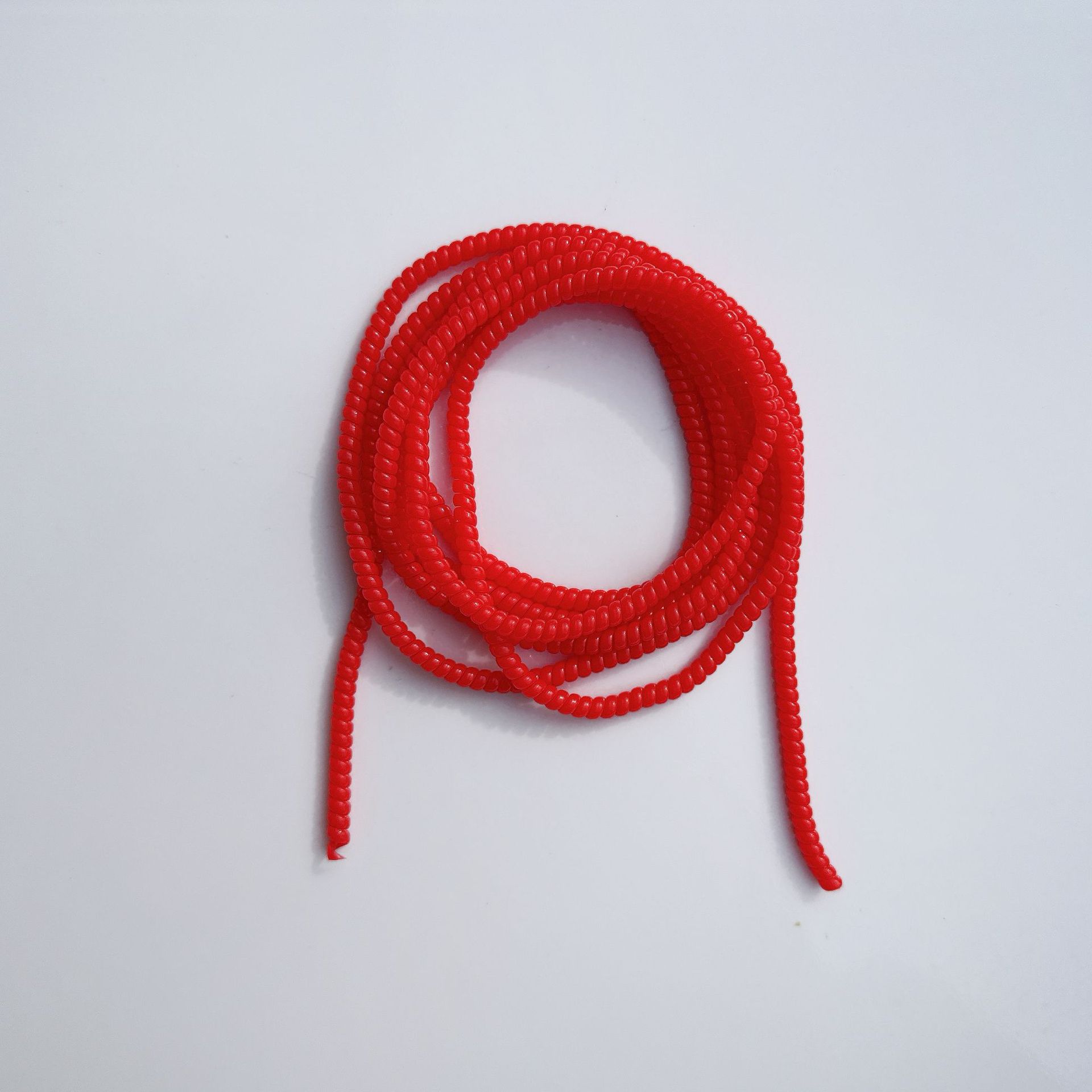 1.4 Cuerdas de protección de color sólido de 1,6 metros de cable de datos para línea de teléfono celular anti-ruptura cargador de cable de bobinado