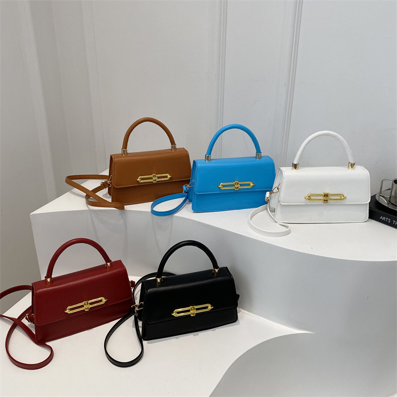 Nicho francés bolso bajo la axila para mujeres 2025 nuevo bolso cuadrado de textura personalidad bloqueo de moda mochila de hombro