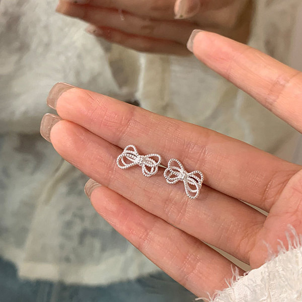 Retro elegant fashionable trend earrings with pigtail with bow