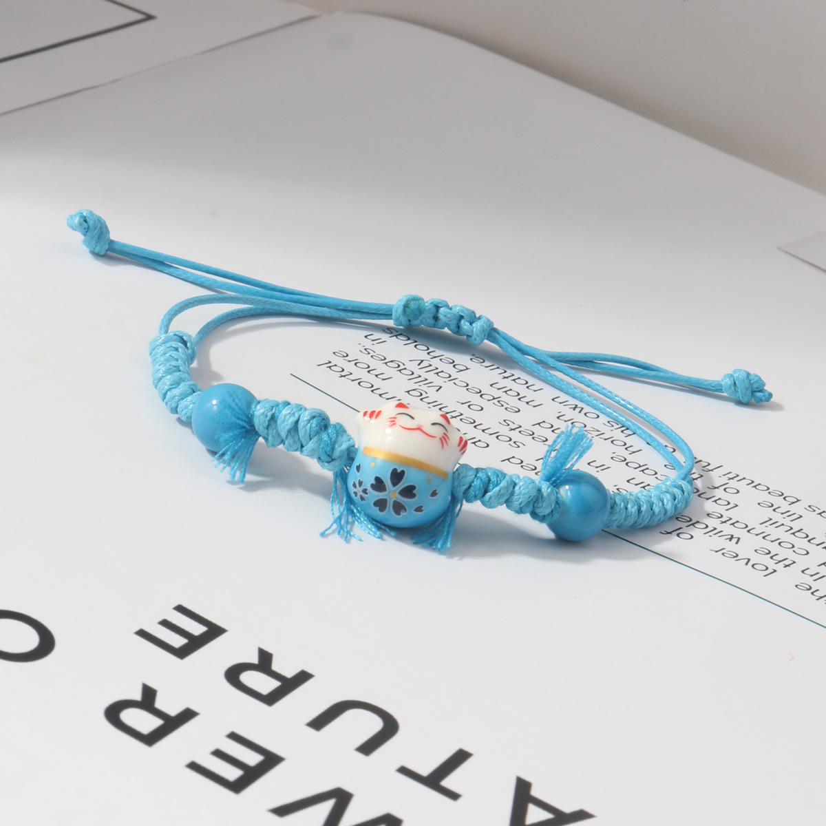 하늘색 태슬 복고양이 팔찌