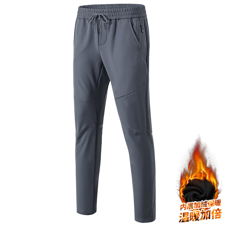 Pantalones de combate al aire libre hombres y mujeres pareja de invierno a prueba de viento impermeable forrado de lana deportes soft shell transpirable montañismo pantalones al por mayor