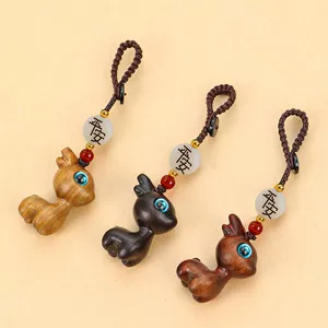 A deer car key chain pendant sandalwood deer buckle key car decoration deer couple pendant