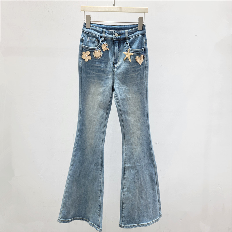Alta sensación tridimensional decoración micropantalones jeans para mujeres 2026 primavera nuevos pantalones jeans elásticos delgados