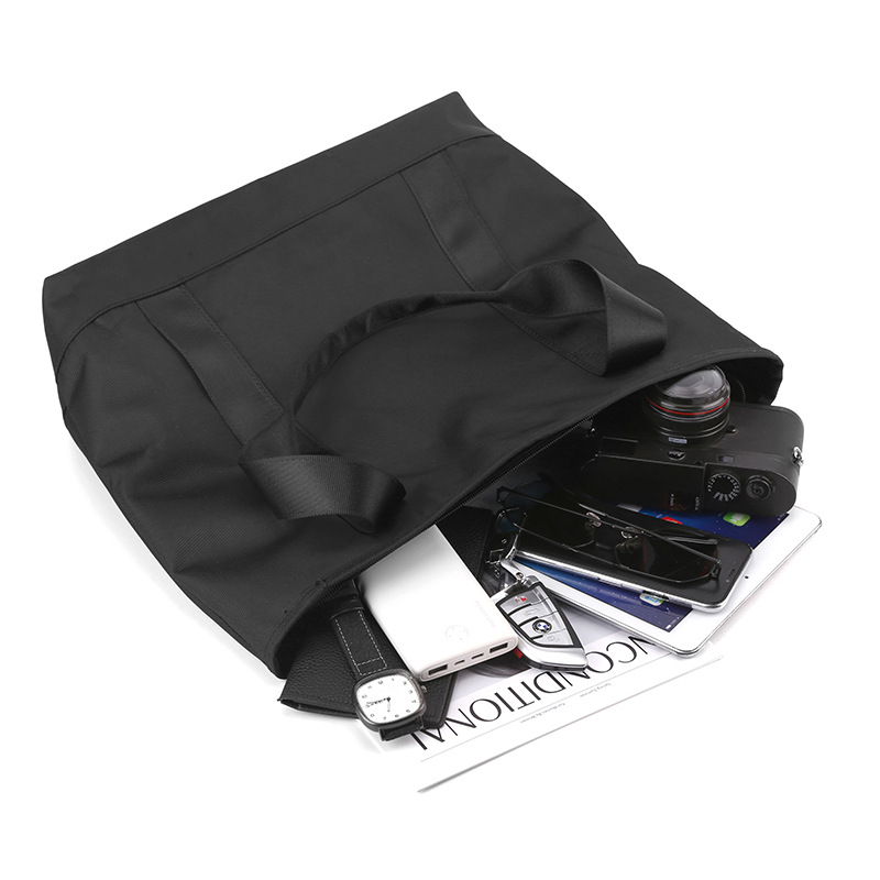 Cremallera casual bolsa de tela de nylon para mujer 2023 nueva bolsa de hombro impermeable de gran capacidad portátil simple Otoño e Invierno bolsa