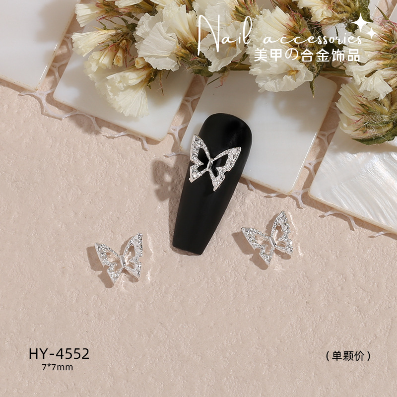 Transfronterizo nueva manicura mariposa plata metal aleación plana estilo japonés Internet celebridad rhinestone DIY accesorios joyería al por mayor