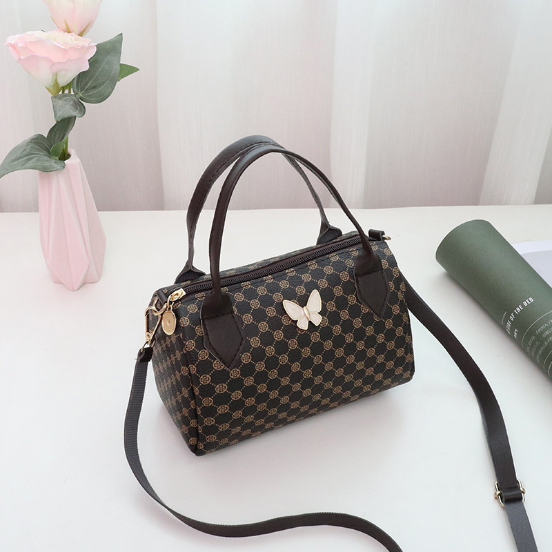 Bolso de mujer 2023 nuevo círculo impresión colgante mariposa bolso de almohada de mano bolso de teléfono móvil casual bolso de comercio exterior image 8