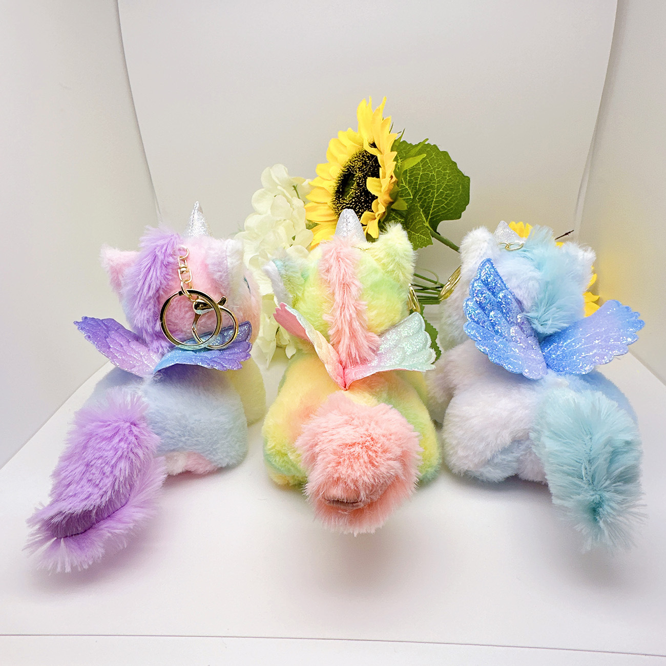 귀여운 봉제 흔들리는 꼬리 유니콘 인형 키 체인 도매 소녀 가방 매달려 부티크 인형 잡아