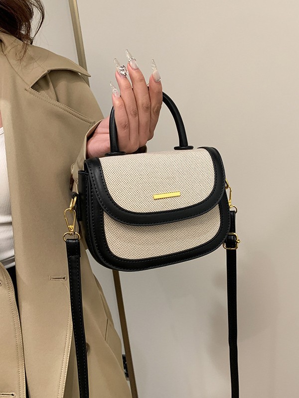 Bolsos de silla de mano de alta textura para mujeres 2026 nueva moda transfronteriza retro color contrastante empalme mochila de hombro