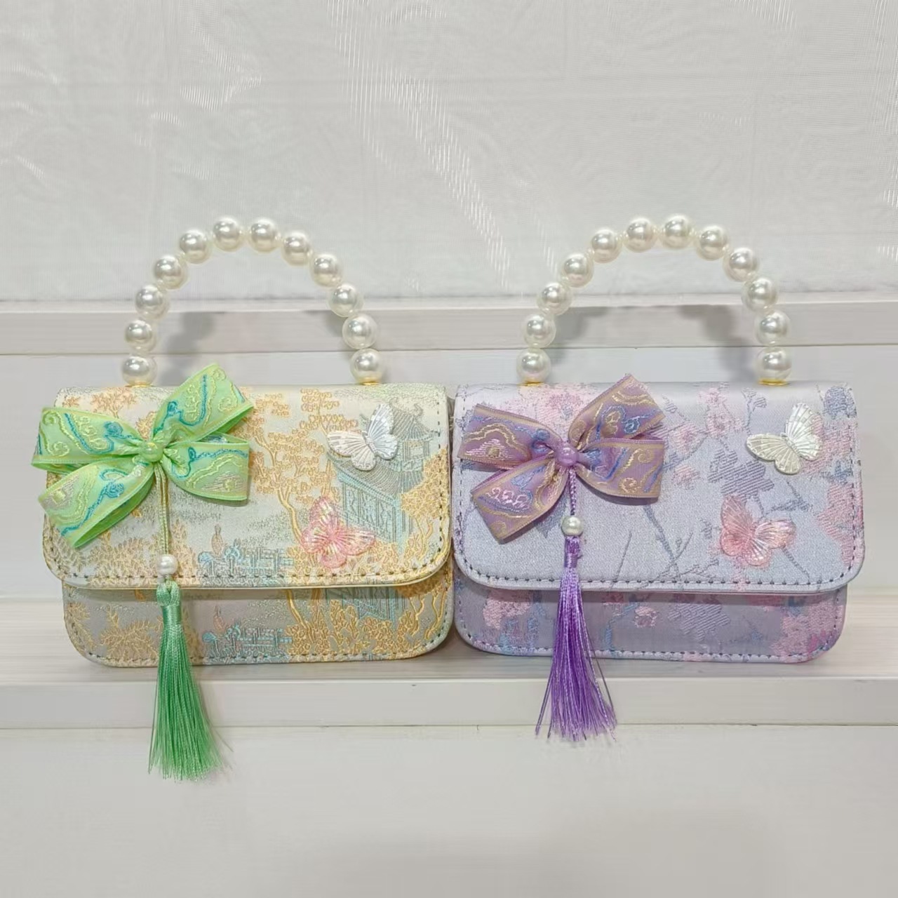 Hermoso bolso de arco de perla para niños nuevo estilo antiguo bolso de borda de color extranjero bolso de hombro con diamantes