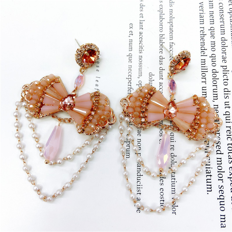 Vintage Exaggerated Bow Shaped Crystal Pearl Tassel Chain Earrings display picture 1