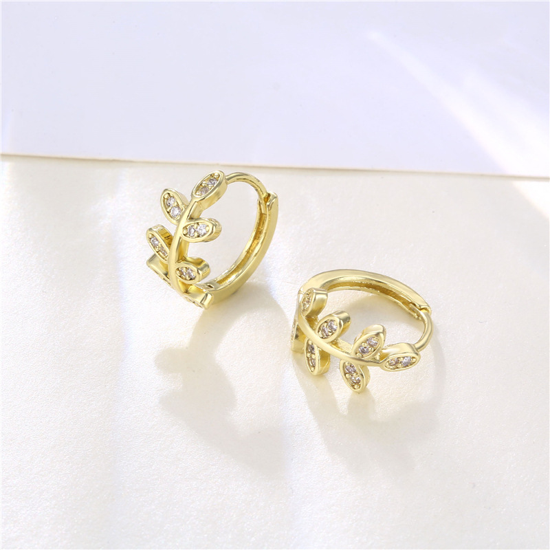 Wholesale Jewelry Hollow Leaf Copper Inlaid Zircon Earrings Nihaojewelry display picture 4