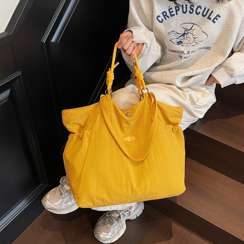Bolsa de viaje de nylon lavable de gran capacidad nueva moda ocio universal bolsa de hombro de mujer