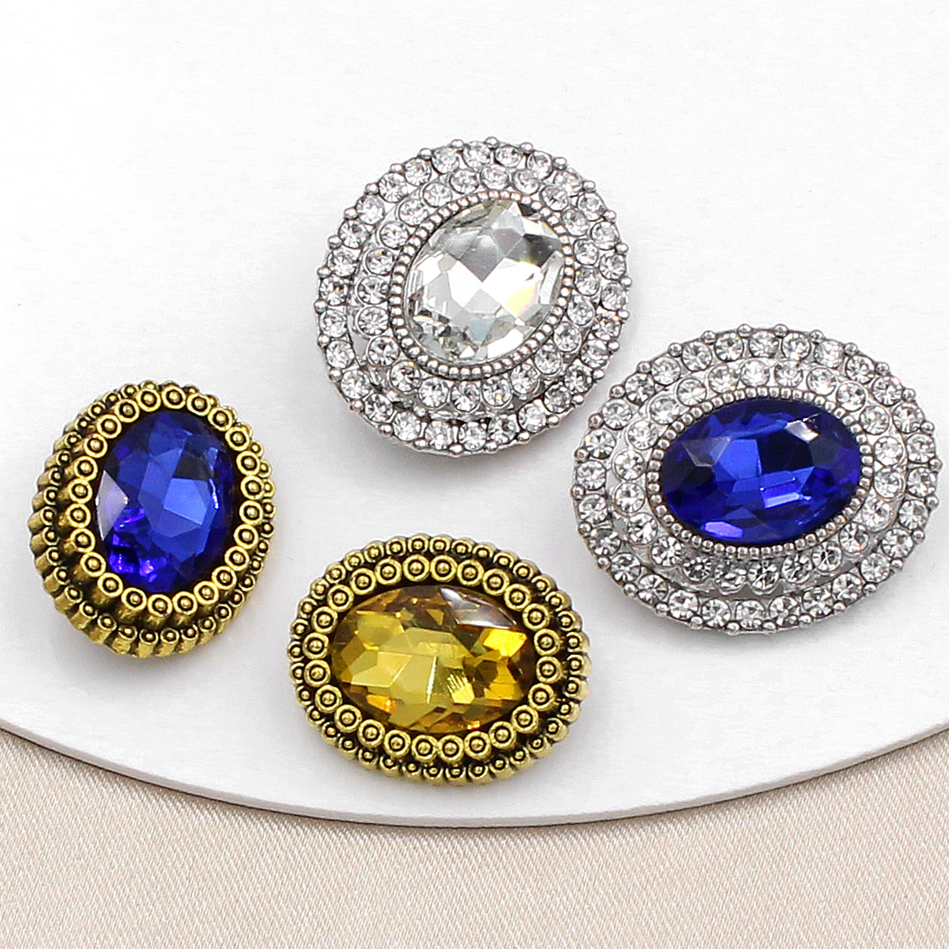 金时代钻扣椭圆水晶金属纽扣新款上市现货直发小香风女服饰手钮扣