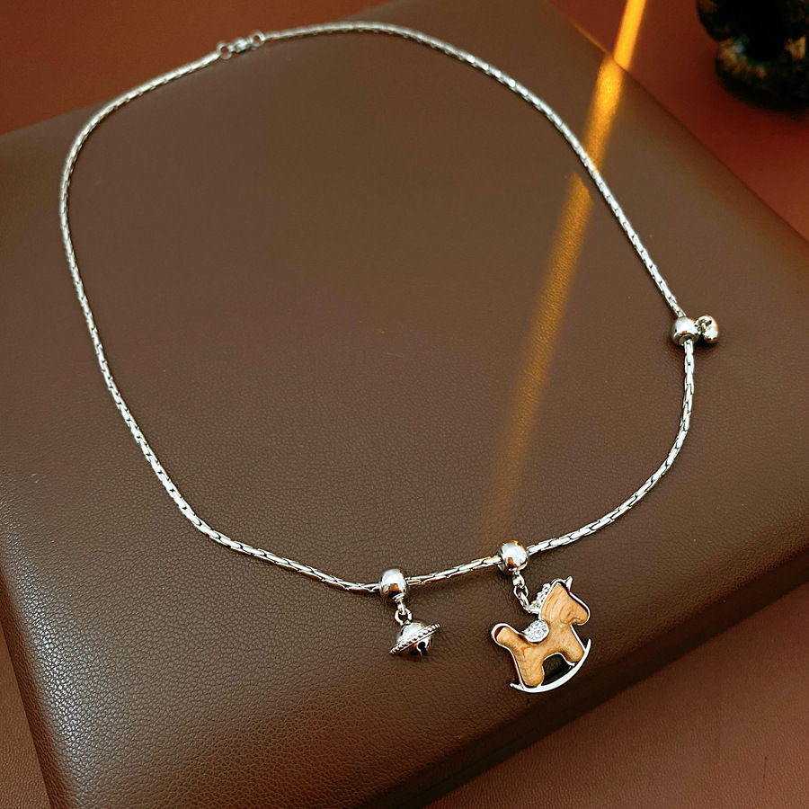 Oro verdadero eléctrico galvanis colgante de piedra pony pendientes collar ligero lujo nicho universal conjunto temperamento alta sensación de joyería mujer