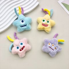 ドーパミンは星の人形の漫画のぬいぐるみの小さい怪獣の形のブローチをからかってアクセサリの学生を飾ります。