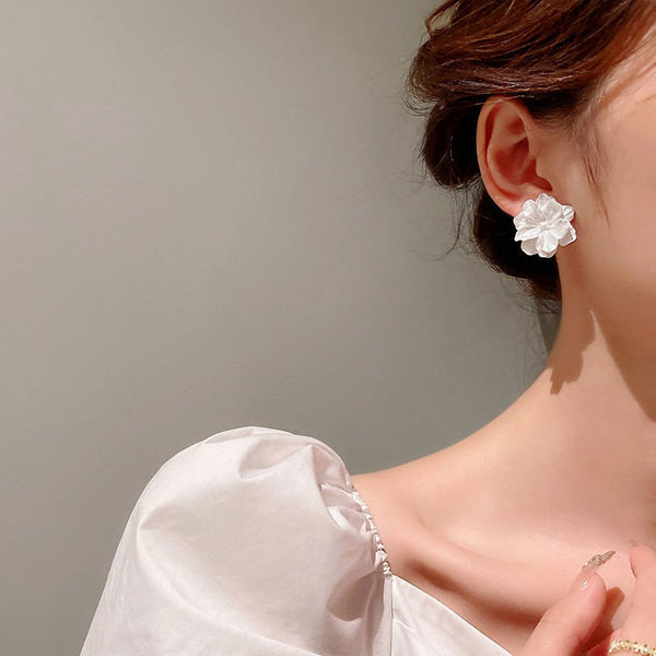 White small design earrings