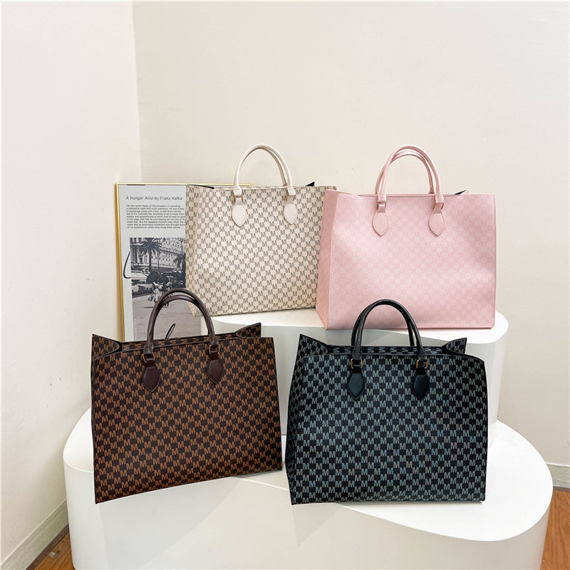 2024 nueva moda simple de gran capacidad impresión retro bolso de mano letras de marea portátil bolsa de mujer de viaje