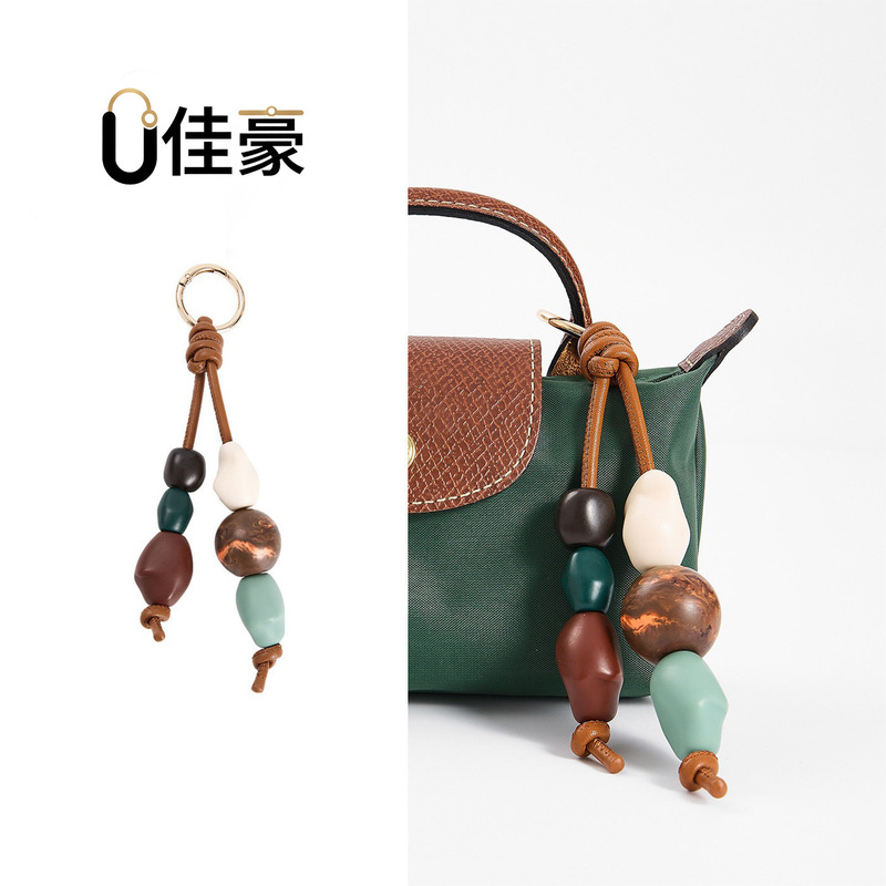 Wholesale ready-to-ship items suitable for Longchamp Xtra ceramic bead charms and new Longchamp bag stone pendants Wholesale ready-to-ship items suitable for Longchamp Xtra ceramic bead charms and new Longchamp bag stone pendants