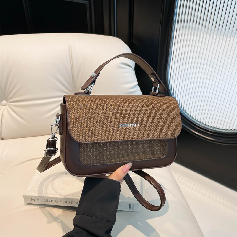 Textura al por mayor de lujo ligero bolso de mano bolso de mujer otoño 2025 nuevo estilo extranjero empalme bolso de hombro bolso de viaje