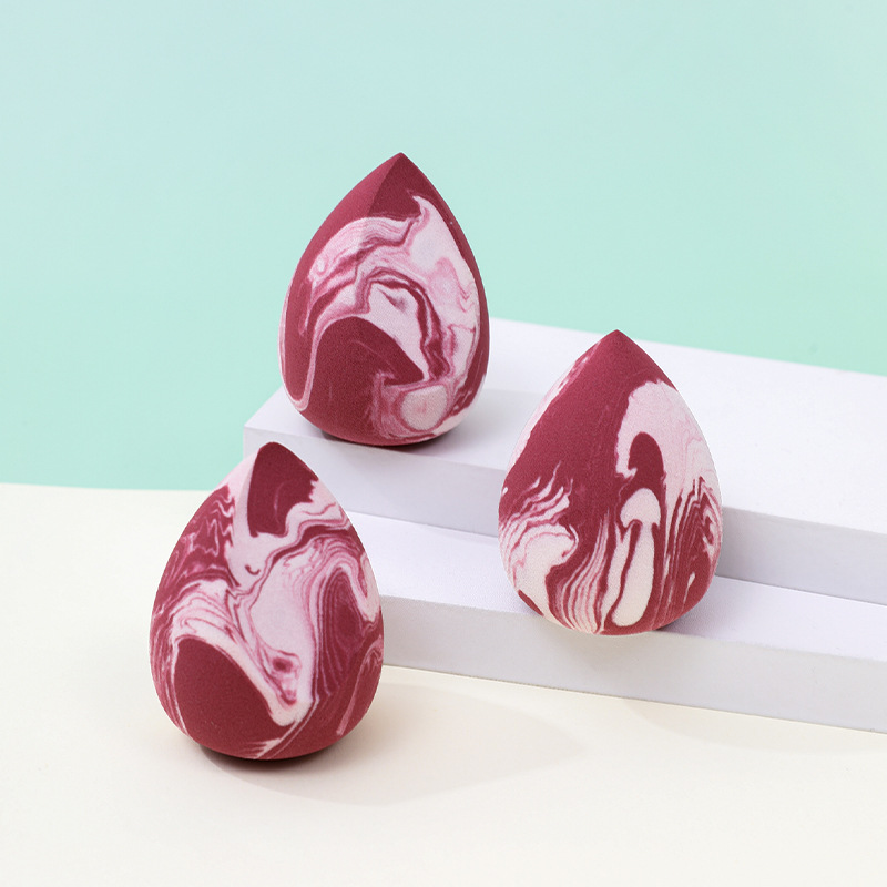 Maquillaje de belleza de color mixto, soplo de polvo de huevo, sin polvo, logotipo personalizado de fábrica, gota de agua sin látex, esponja de maquillaje en forma de calabaza, cojín de aire