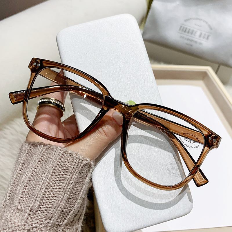 Nuevo Marco de uñas de color beige gafas de luz anti-azul artefacto de belleza liso marco grande que adelgaza versátiles hombres y mujeres gafas de luz anti-azul