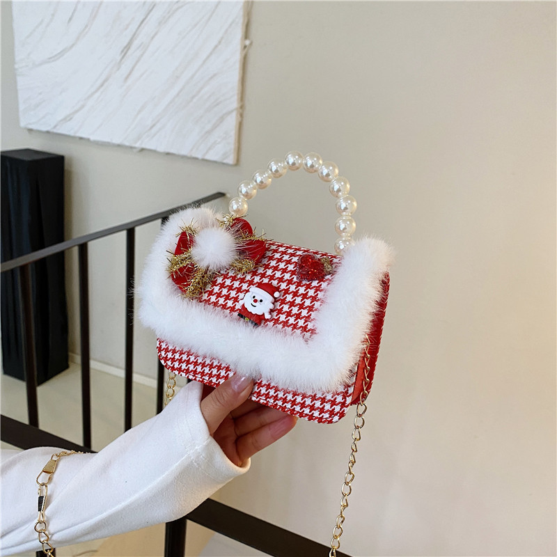 Mini moda para niñas bolso de cambio de perlas 2024 nuevo patrón de moda coreana bolso de ropa infantil