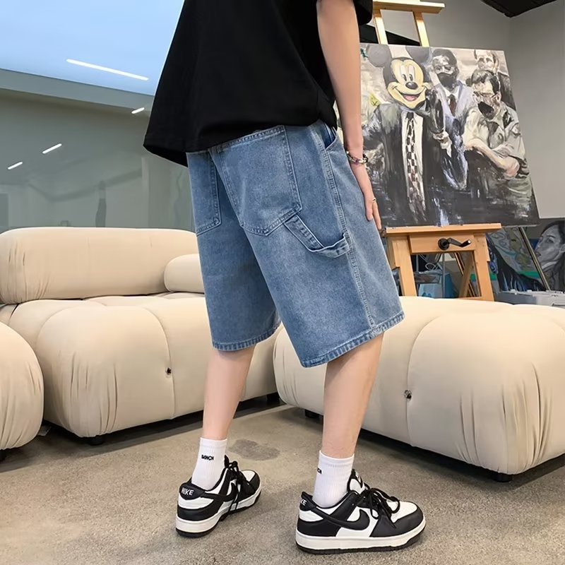 Ropa de trabajo pantalones cortos de mezclilla pantalones cortos de pierna ancha estilo de Hong Kong de estilo fino de verano para hombres pantalones sueltos de marca de moda con bolsillos grandes